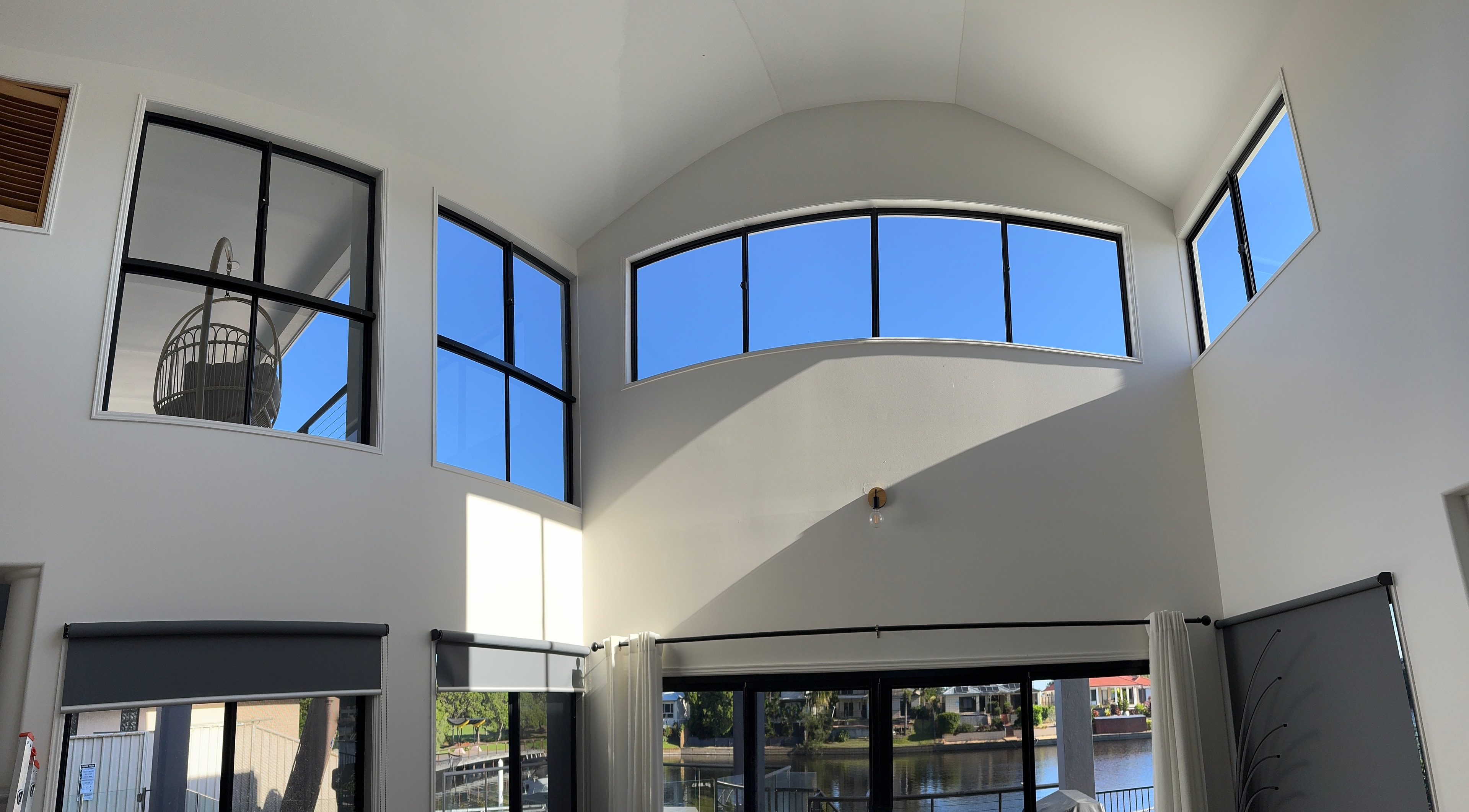 Modern curved interior with skylight windows
