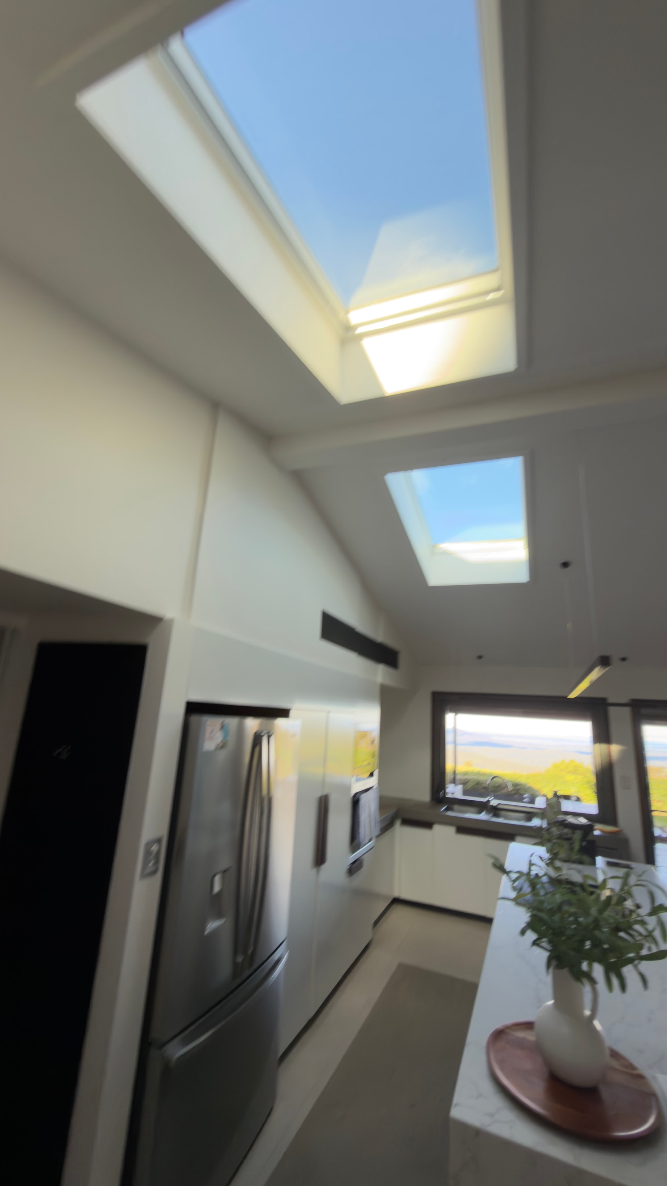 Modern kitchen with skylights