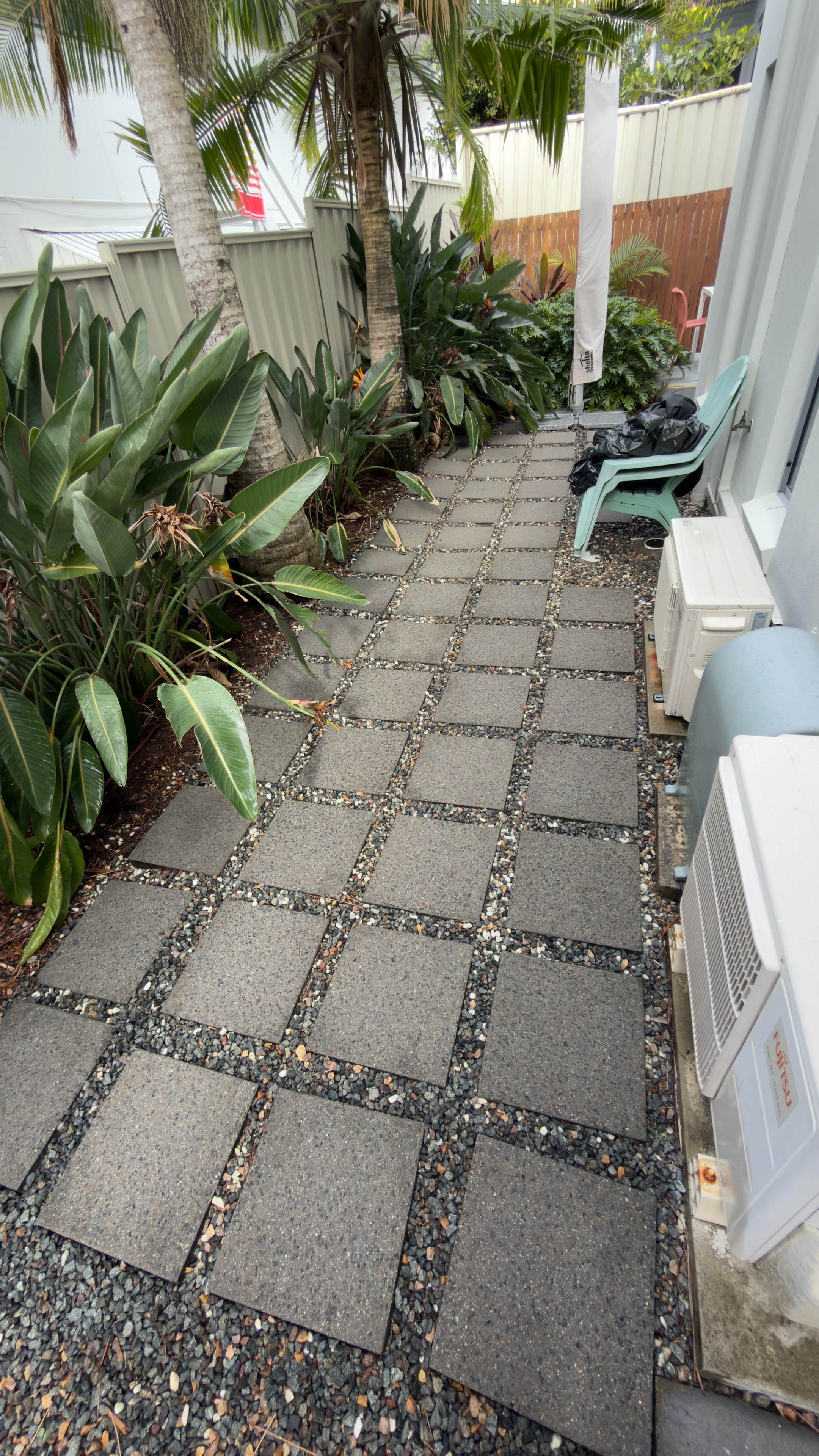 Tropical courtyard with paved pathway